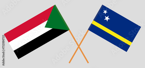 Crossed flags of the Sudan and Country of Curacao. Official colors. Correct proportion
