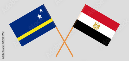 Crossed flags of Country of Curacao and Egypt. Official colors. Correct proportion