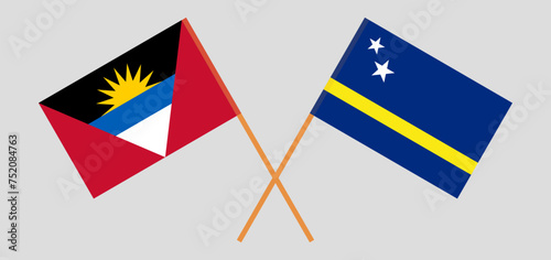 Crossed flags of Antigua and Barbuda and Country of Curacao. Official colors. Correct proportion
