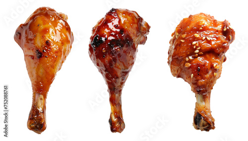 BBQ Grilled chicken drumsticks on a wooden cutting board. Isolated on white background photo