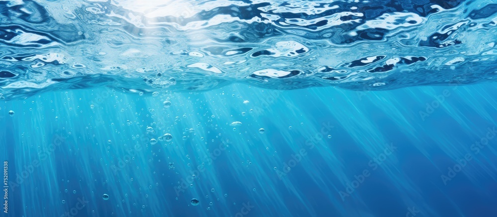 Obraz premium Vibrant Blue Water Surface with Refreshing Bubbles and Sparkling Splashes