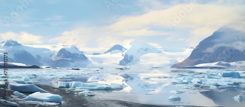 Majestic Breidamerkurjokull Glacier: Melting Ice and Rocky Hilltop with a Panoramic View photo