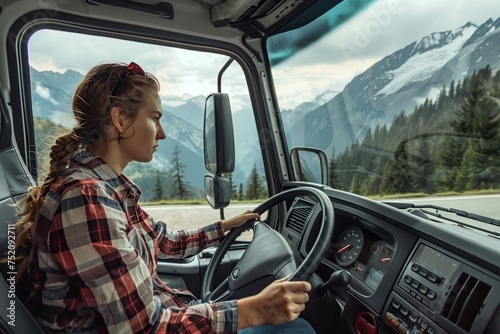 woman behind the wheel of a fast moving truck in a forest mountain