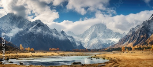 Majestic Altai Mountain Range with Dramatic Clouds in Autumn Landscape