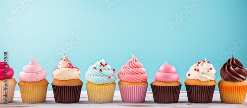 Variety of Delightful Cupcakes with Colorful Toppings in a Sweet Confectionery Display