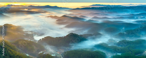 Aerial view of Xuan Tho suburbs near Da Lat city at morning with misty and sunrise sky. This place is considered most beautiful and peaceful place to watch sunrise in highlands of Vietnam photo