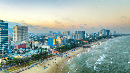 Vung Tau is a famous coastal city in the South of Vietnam. Vung Tau city aerial view in the sunset, Vung Tau is the capital of the province since the province's founding. Travel concept © huythoai