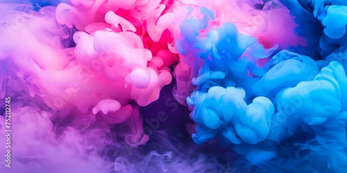 Pink and blue ink clouds in water, an abstract artistic vibrant texture.