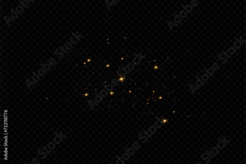 Golden sequins glow with many lights. Glittering dust. Luxurious background of golden particles.	