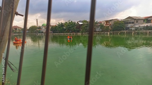 Jakarta  26 February 2024 - The search situation of the National SAR Agency team is looking for a small child who drowned in the lake