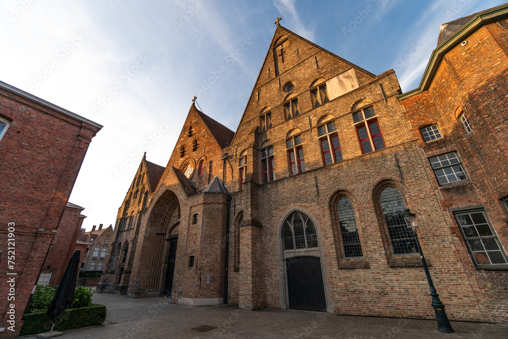St. John hospital (Sint-Janshospitaal) in the old town of the beautiful city of Brugge in Belgium, with its historic facades. St. John hospital (Sint-Janshospitaal) in the old town of the beautiful city of Brugge in Belgium, with its historic facades.