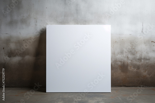 a medium sized blank square canvas hanging on a concrete wall Generative AI 