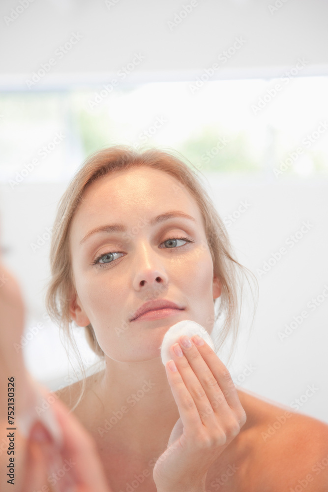 Woman Using Cleansing Cotton Pad on Face
Woman Using Cleansing Cotton Pad on Face