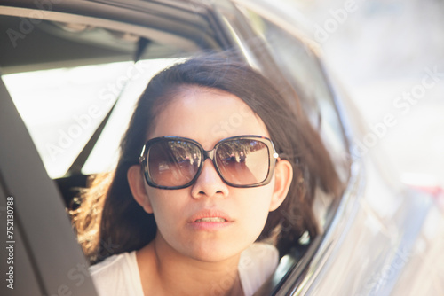 Woman Looking out of Car Window
 photo