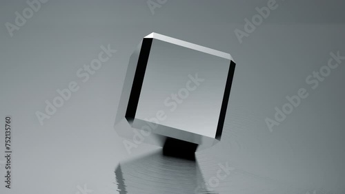 3D cube moving unpredictably on its axis over a liquid surface and creating ripples. 4k Loop.