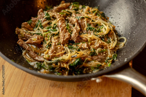 delicious Korean dish: veal in a wok close-up