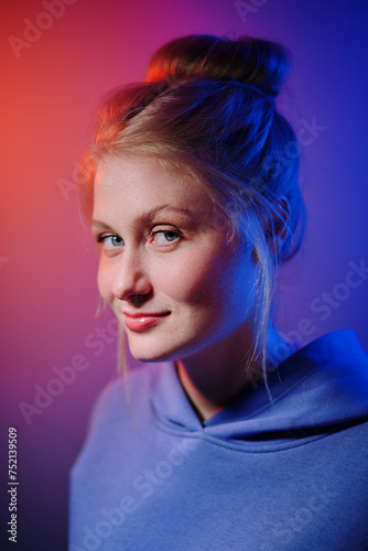 Colorful close-up studio portrait of a young woman © luengo_ua