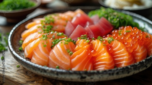 Sashimi sushi served with pieces of fresh fish such as salmon, tuna and hamachi