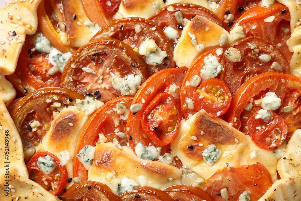 Tasty galette with tomato and cheese (Caprese galette) as background, top view Tasty galette with tomato and cheese (Caprese galette) as background, top view