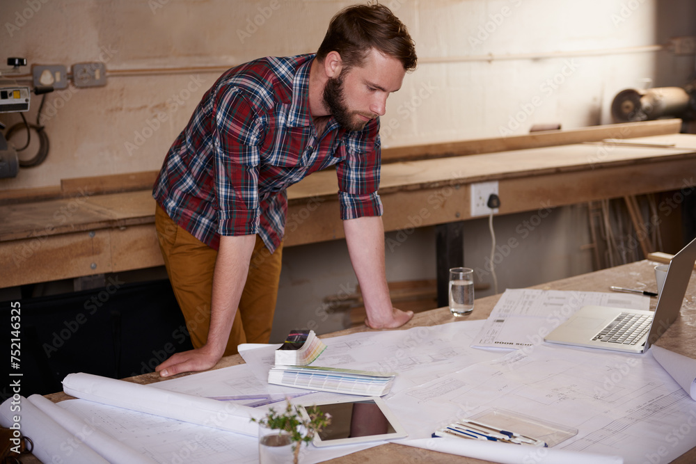 Man, check blueprint and architect with engineering or construction ...
