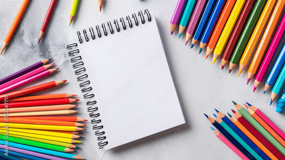 A burst of creative potential with a notebook amid a spectrum of colored pencils. AI Generative. A burst of creative potential with a notebook amid a spectrum of colored pencils. AI Generative.