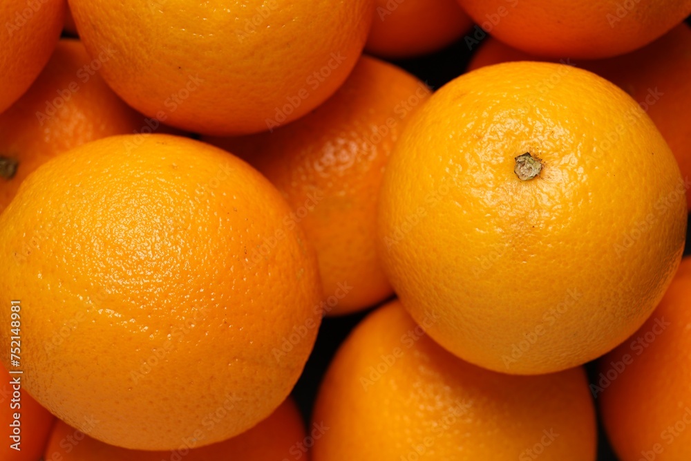 Tasty ripe fresh oranges as background, top view Tasty ripe fresh oranges as background, top view