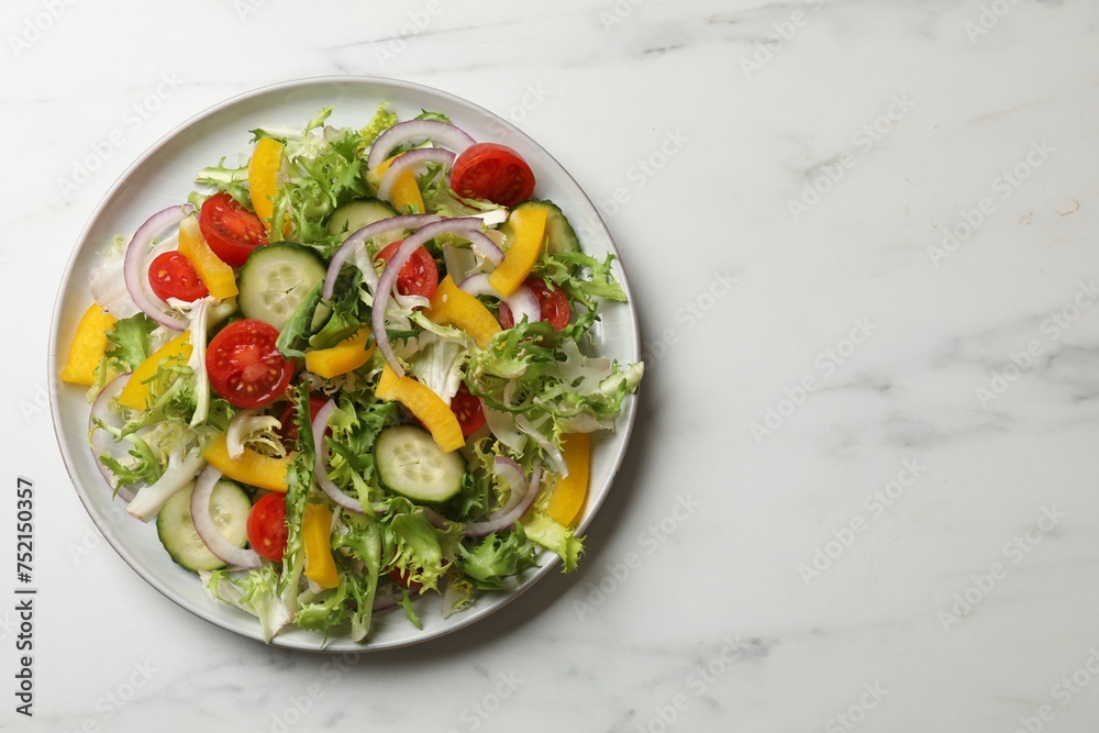 Tasty fresh vegetarian salad on white marble table, top view. Space for text Tasty fresh vegetarian salad on white marble table, top view. Space for text