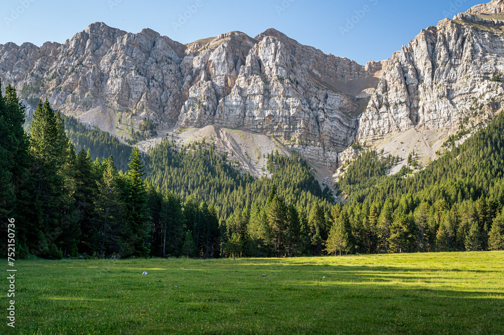 Picturesque mountain landcaspe with blue sky and green valley