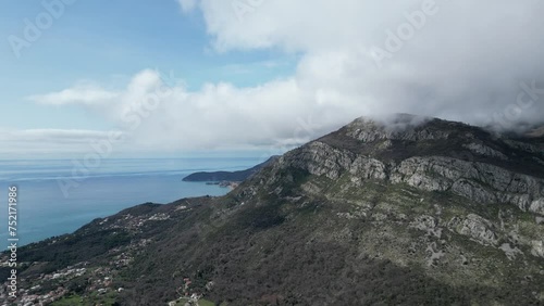 Peak of a mountain with a steep cliff. Montenegro.