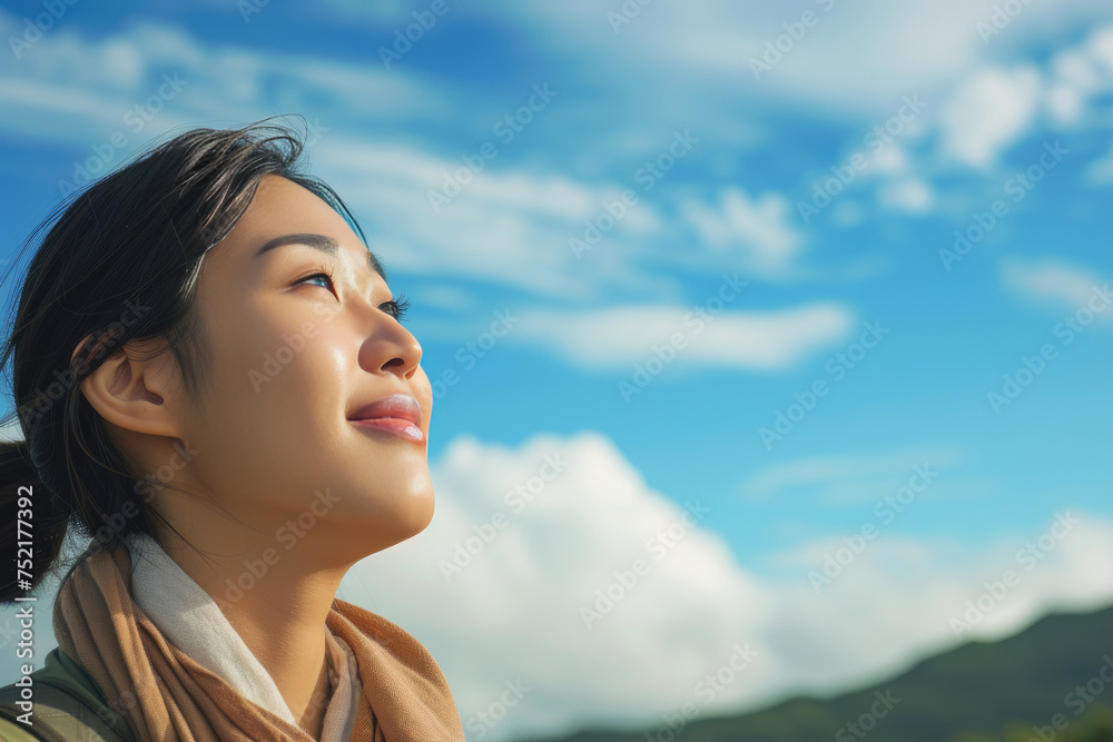 Uplifted Spirits: Asian Woman Embracing the Mountain's Freshness Uplifted Spirits: Asian Woman Embracing the Mountain's Freshness