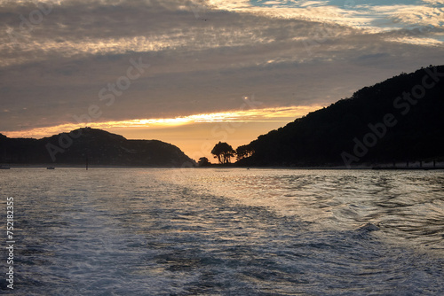 Cies Islands in Galicia Spain seen from the boat returning to Vigo at sunset.