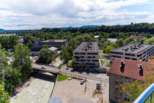 Aerial view of bridge over Kokra River seen from viewpoint platform at the old town of Kranj on a sunny summer day. Photo taken August 10th, 2023, Kranj, Slovenia. photo