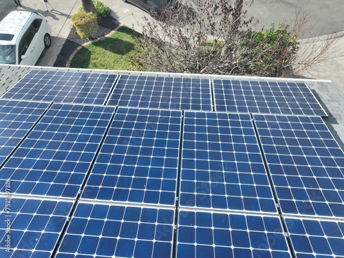 Aerial view of solar panels on an urban rooftop