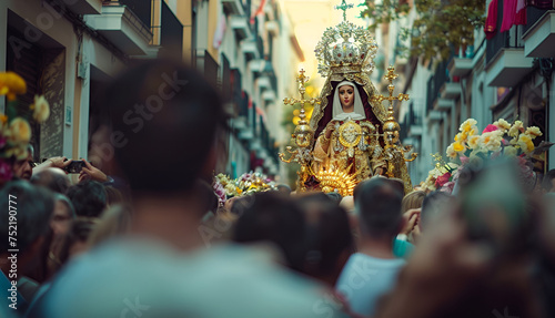 Holy Week procession through the streets of Seville with thousands of parishioners venerating the image of the Virgin. Christian religious iconography photo