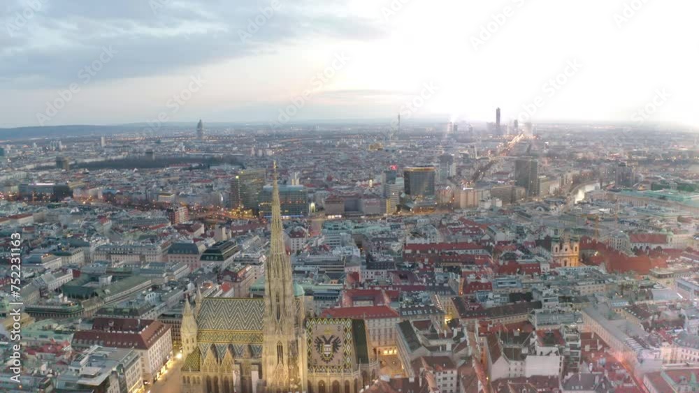 Aerial: Moving Toward and Circle St. Stephen's Cathedral in Vienna, Austria, Vienna skyline at sunrise old town vienna cathedral Cathedral Aerial: Moving Toward and Circle St. Stephen's Cathedral in Vienna, Austria, Vienna skyline at sunrise old town vienna cathedral Cathedral
