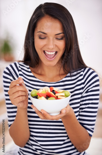 Fruit, diet and healthy eating for excited woman, salad and happy for fresh food. Natural, nutrition and sustainable for vegetarian, fiber and breakfast or dessert for minerals and vitamins