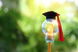 light bulb and graduation cap. Idea of education, technology