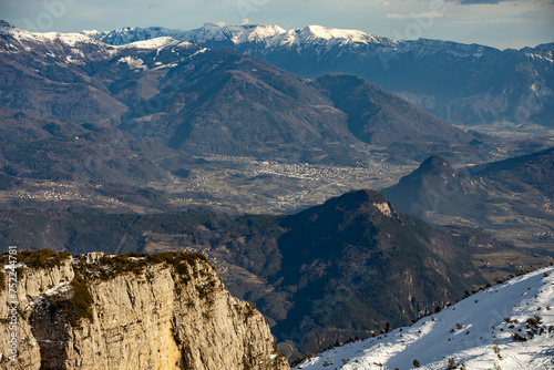 Ski resort Paganella Andalo, Trentino-Alto Adige, Italy. Ski slopes and snow holidays in Andalo in the Italian Dolomites, ski resort in the Alps. Snow covered Italian Dolomites at winter. photo