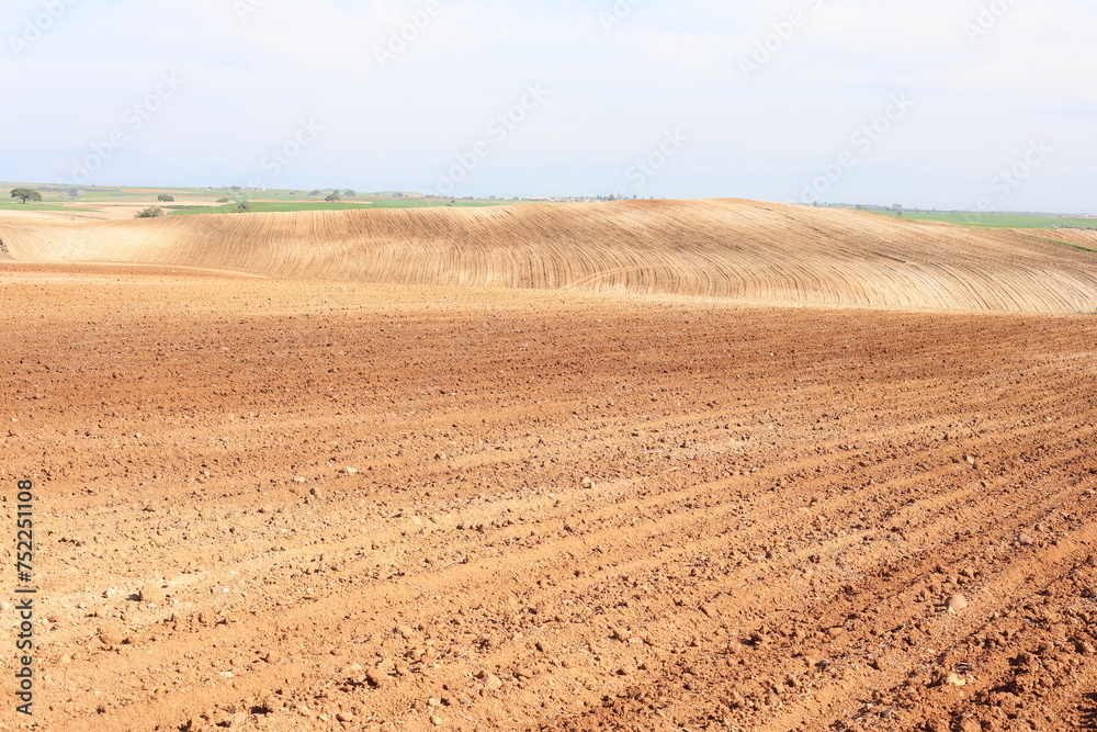 Agricultural field ploughed in spring. Arable land ready for the next cultivation season