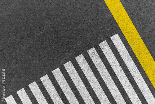 Obraz na płótnie Crosswalk top view on asphalt background Safety driving concept.