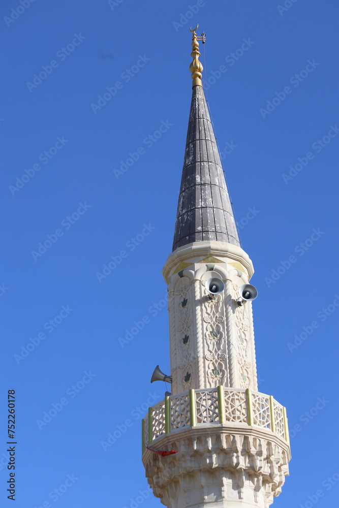 minaret of a mosque with islamic engravings minaret of a mosque with islamic engravings