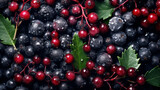 Close-up of Fresh Dew-covered Red Currants and Blackberries with Green Leaves.