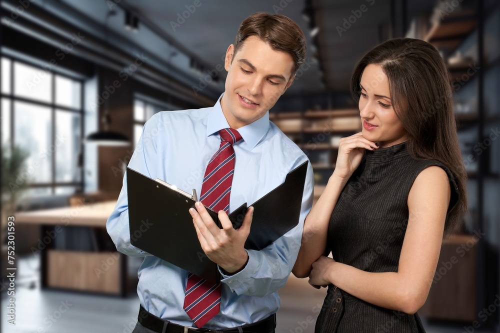 busy business workers discussing project in office busy business workers discussing project in office
