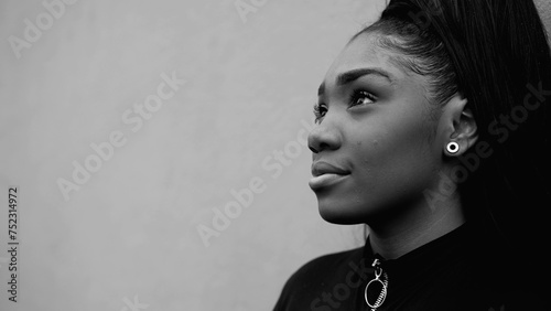 Billede på lærred One peaceful contemplative young black woman gazing at sky in tranquility and qu