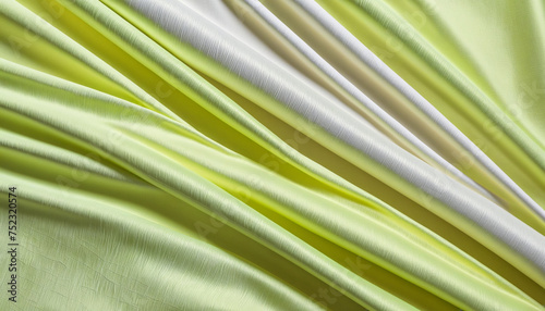 Yellow-green and white fabric background