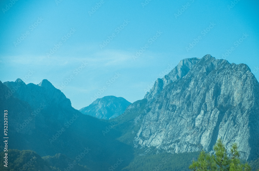 Naklejka premium mountain landscape with clouds