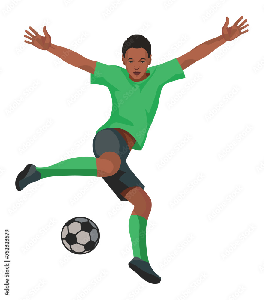 Black boy playing football in green T-shirt who jumps up preparing to kick the ball with his foot
