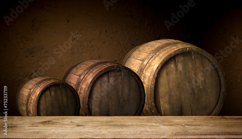 Three hardwood barrels, tinted in shades of oak, sit atop a wooden table at the winery event. The natural material blends with the metal circle accents and wood stain finish
