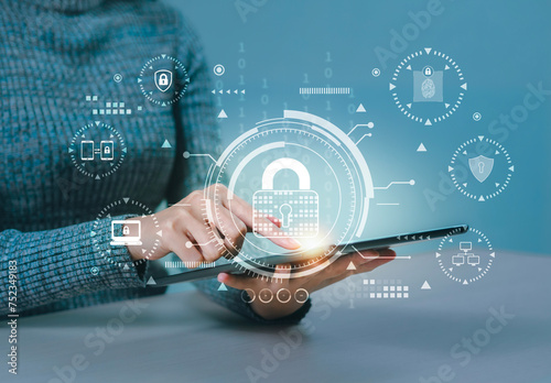 Cyber security network. Data Protection. Padlock icon and internet technology networking. Businessman protecting data personal information on tablet and computer code on virtual interface. photo