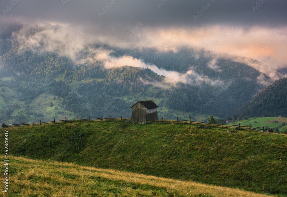 Foggy morning in the mountains. Summer dawn in the Carpathians. Nature of Ukraine